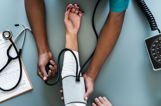 A person getting their blood pressure checked